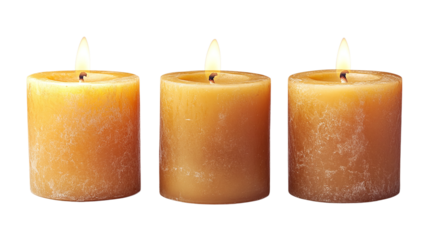 Three pillar candles with flames illuminated, cut out. Isolated on a transparent background.