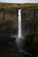 Haifoss Waterfall Cascading Down Cliffs in Iceland