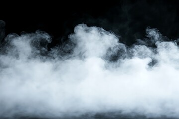 Fototapeta premium White cloud of smoke on a black background. Close-up.