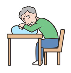 起座呼吸、椅子に座ってクッションにもたれている高齢者の男性