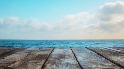 Fototapeta premium Empty Wooden Table with Ocean View Under Bright Blue Sky