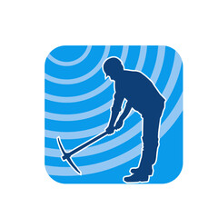 Silhouette of a construction worker in action with a pick axe tool. Silhouette of a miner labour in heavy duty work.