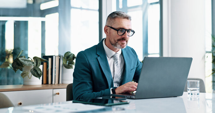 Office, mature and businessman with laptop for email, financial report and auditing for corporate firm. Career, male person and accountant with tech for investment research, administration and smile