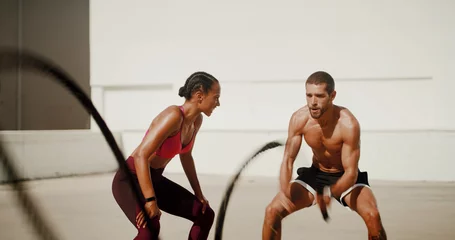 Fotobehang Persoonlijk Woman, man and personal trainer with fitness ropes for muscle growth, motivation and outdoor for exercise. People, coach or mentor with support, workout and resilience for bodybuilding challenge  © peopleimages.com