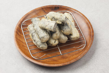  Kimmali is a dish made by wrapping vegetables or noodles in seaweed, coating them in batter, and...