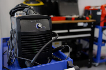Welding Equipment Ready for Use in a Modern Workshop With Organized Tools and Accessories