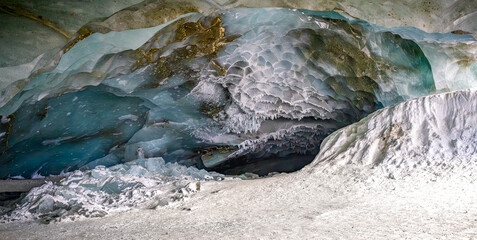 Ice cave tunnel in glacier in Alaska 