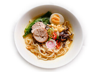 Ramen noodle with sliced beef meat egg and vegetables on a white bowl