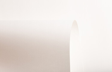 White and beige paper background with a smooth, soft texture. Warm off-white tones create an...