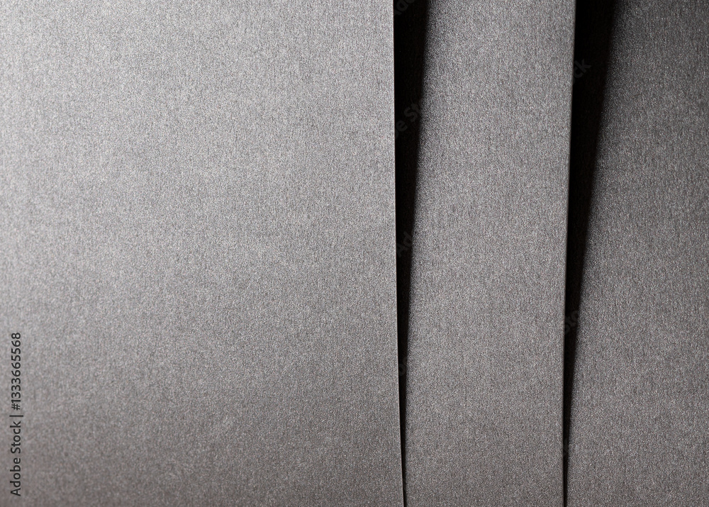 Poster silver and gray metallic paper background with a pearlescent, glossy texture. shiny, sleek tones cre