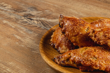 Homemade pumpkin pastries served on a wooden plate with a rustic background