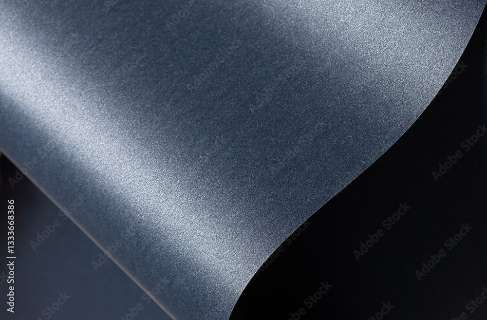 Aufkleber Blue paper background with a smooth, glossy texture and pearlescent finish. Deep, cool tones with a metallic shimmer create an elegant, luxurious design with wavy curves and a reflective gradient,.