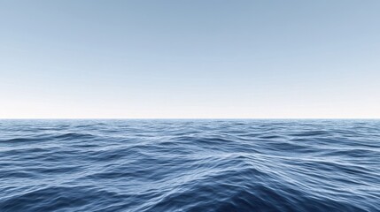 Obraz premium Gentle ocean waves ripple beneath a calm, clear sky, creating a serene and tranquil seascape.