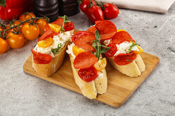 Bruschetta tapas with chorizo and tomato
