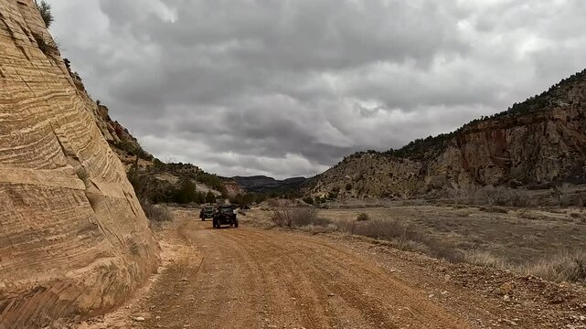 Utah desert trail off road recreation ride POV 4K. Recreation off road, nature exploring. Desert mountain canyon valley trail ride area. Rocky, forest, desert hill, river crossings.