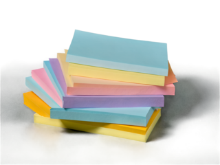 Pastel Colored Sticky Notes Stacked Neatly for Organization and Planning