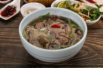 Vietnamese Pho Bo soup with beef and noodles