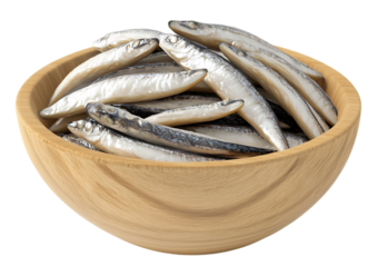 Korean anchovies (myeolchi) placed in a small wooden bowl on transparent background