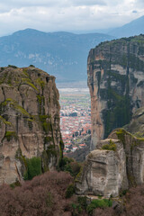 Meteora landscape with giant natural stone pillars, with Kalabaka town on the background, Greece
