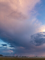 A cloudy sky with a purple hue