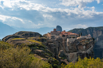 Meteora landscape with Holy Trinity monastery on top of giant natural pillars, Kalabaka, Greece