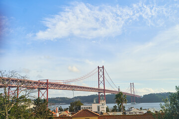 A breathtaking and stunning view of an iconic landmark bridge set against a picturesque backdrop of nature