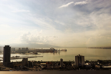  Cityscape at sunset with bay view

Description: The photo shows a panoramic view of the city from...