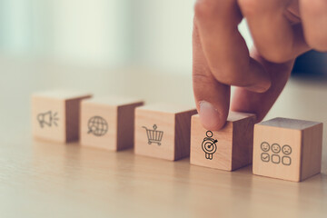 Customer behavior analysis concept. Wooden blocks with customer journey and customer experience...