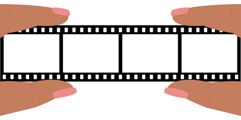 hand holding film strip