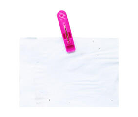 blank note paper with pink clothespin on white background isolated