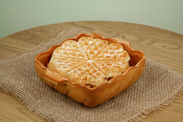 Waffle on the table. View from above. Freshly baked homemade waffle