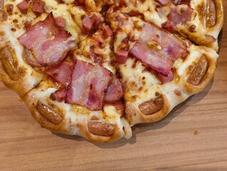 Hot pizza Margaritas on a gray concrete countertop. Cheese in a pizza crust. Tasty vegetable pizza