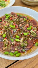 Food beef carpaccio with beens and olive oil 