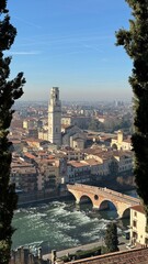 High panoramic view of Bergamo city with buildings, sunlight and scenery 