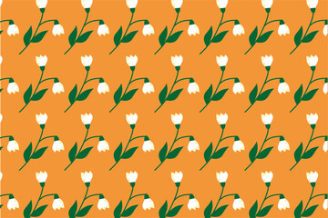 Seamless pattern with leaves and snowdrop flowers on an orange background.Vector illustration