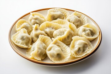 Plate of Asian dumplings on white background