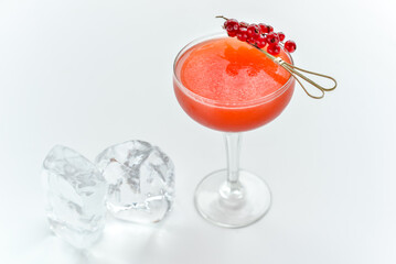 Bright cocktail with red currant