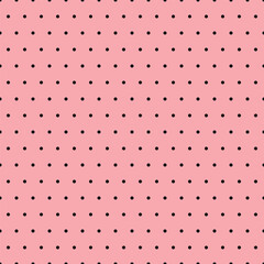 Black points on a pink background. Seamless pattern. Basic arrangement, classic, retro style. Background for paper, gift wrap, textile, card, cover.