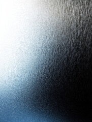 Textured Metallic Surface with Gradient Lighting for Industrial and Artistic Design