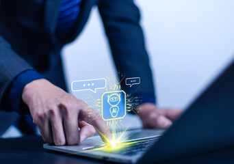 Businessman using AI robot technology. A man uses a laptop to talk to AI artificial intelligence. Future technology. 