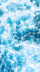 Naklejka premium Whitecaps and foam on vibrant blue ocean water