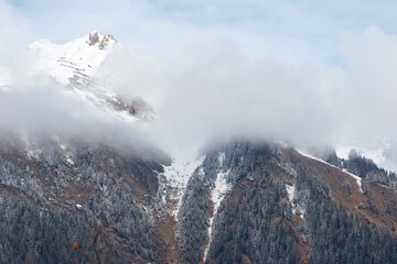 Spring&rsquo;s Ascent: From Earth to Snow, Through the Veil of Clouds