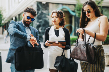 A group of diverse business people are gathered in an urban setting, engaging in a collaborative discussion and strategizing on projects to enhance sales growth.