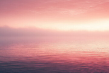 Obraz premium Serene pink sunset over calm water with soft gradients