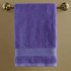Purple bath towel hanging on a towel rack in a bathroom.  Use for home decor websites or online stores selling towels