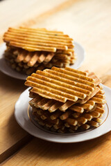 Potato waffles with sauce and parsley, delicious food