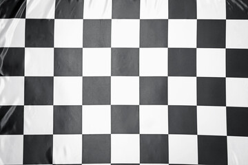 Obraz premium Checkered finish flag as background, top view