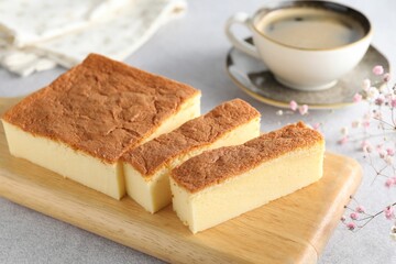 Tasty Japanese Castella sponge cake served on light table, closeup