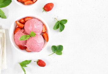 Strawberry ice cream in  white bowl