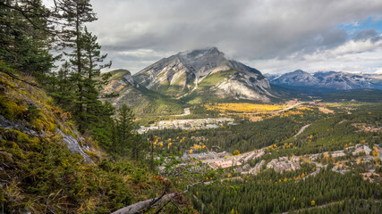 Rocky Mountains in the distance looking over the Trans Canada Highway and Cascade Mountain in the Banff National Park - taken from Tunnel Mountain